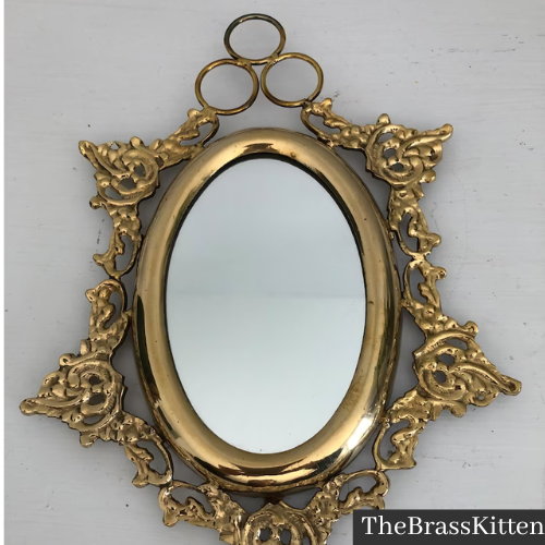 TheBrassKitten brass wall mirror